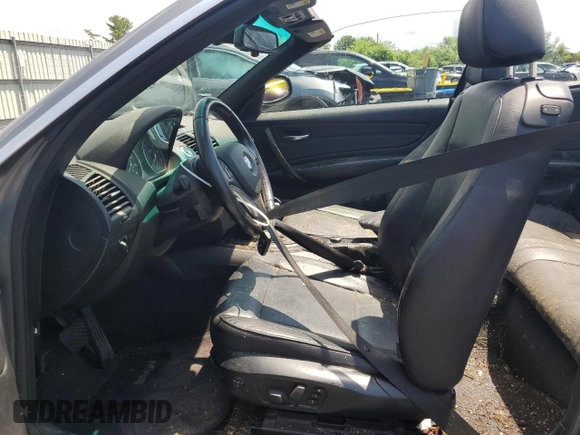 2011 BMW 1 Series 128i with VIN WBAUN1C52BVH82744, listed as a Copart auction lot 63441125 with 129,245 mi miles and Salvage title. Bid and sale history available at DreamBid. Image 7.