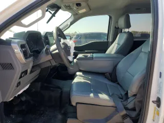 2023 Ford F-150 XL with VIN 1FTEW1C5XPKF56011, listed as a Copart auction lot 50724605 with 25,420 mi miles and Salvage title. Bid and sale history available at DreamBid. Image 7.