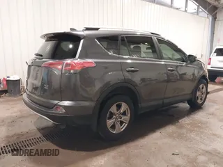 2016 Toyota RAV4 XLE with VIN 2T3RFREV5GW534129, listed as a IAAI auction lot 42359801 with 52,025 mi miles and . Bid and sale history available at DreamBid. Image 4.