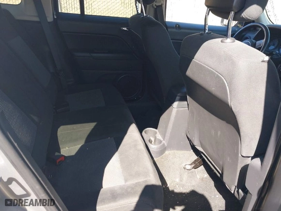 2014 Jeep Patriot Latitude with VIN 1C4NJRFB6ED883893, listed as a IAAI auction lot 41780864 with 119,610 mi miles. Bid and sale history available at carsss.com. Image 8.