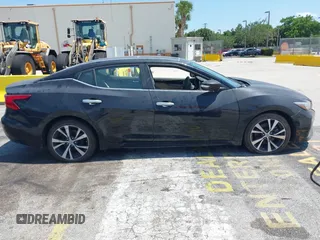 2019 Nissan Maxima Platinum z VIN 1N4AA6AV8KC366407, wystawiony jako IAAI lot #42329455 z przebiegiem 34 518 mil mil oraz . Historia ofert i sprzedaży dostępna na DreamBid. Obrazek 13.