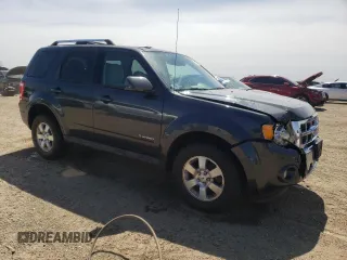 2010 Ford Escape Hybrid z VIN 1FMCU4K32AKB79563, wystawiony jako Copart lot #52892885 z przebiegiem 177 008 mil mil oraz Szkoda całkowita • Salvage title. Historia ofert i sprzedaży dostępna na DreamBid. Obrazek 4.
