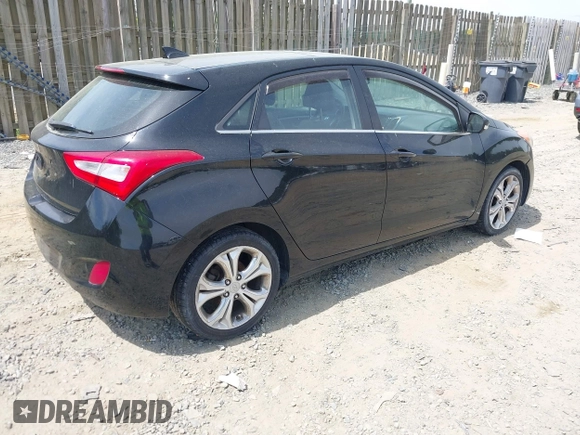 2014 Hyundai Elantra GT with VIN KMHD35LH5EU171894, listed as a IAAI auction lot 42123853 with 97,541 mi miles. Bid and sale history available at carsss.com. Image 4.