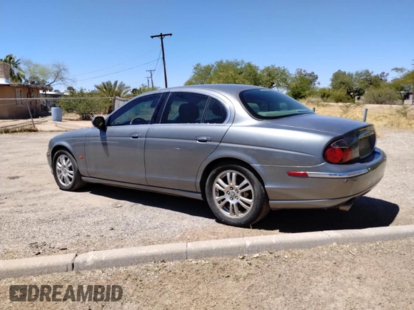 2003 Jaguar S-Type with VIN SAJEA01U93HM78946, listed as a Copart auction lot 54582105 with 132,560 mi miles and Clean Title. Bid and sale history available at DreamBid. Image 3.
