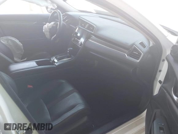 2020 Honda Civic EX-L with VIN 19XFC1F76LE204292, listed as a IAAI auction lot 41939998 with 39,765 mi miles and . Bid and sale history available at DreamBid. Image 5.