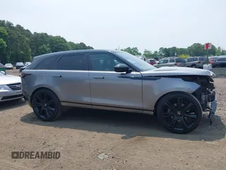 2020 Land Rover Range Rover Velar z VIN SALYM2EV8LA274870, wystawiony jako IAAI lot #42479938 z przebiegiem 43 039 mil mil oraz . Historia ofert i sprzedaży dostępna na DreamBid. Obrazek 13.