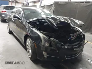2014 Cadillac ATS Premium AWD z VIN 1G6AL5S36E0107886, wystawiony jako IAAI lot #42110658 z przebiegiem 94 936 mil mil oraz . Historia ofert i sprzedaży dostępna na DreamBid. Obrazek 1.