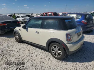 2013 MINI Hardtop with VIN WMWSU3C56DT682857, listed as a Copart auction lot 77677234 with 92,625 mi miles and Clean Title. Bid and sale history available at DreamBid. Image 2.