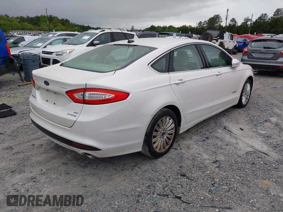 2014 Ford Fusion SE Hybrid with VIN 3FA6P0LU3ER312041, listed as a IAAI auction lot 41964588 with 138,566 mi miles and . Bid and sale history available at DreamBid. Image 4.