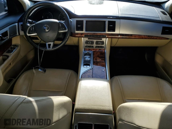 2014 Jaguar XF SC with VIN SAJWA0EX3E8U29494, listed as a Copart auction lot 76844324 with 103,776 mi miles and Clean Title. Bid and sale history available at DreamBid. Image 8.