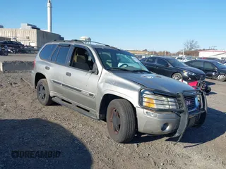 2002 GMC Envoy SLT with VIN 1GKDT13S822304832, listed as a IAAI auction lot 40874054 with 132,883 mi miles. Bid and sale history available at carsss.com. Image 6.