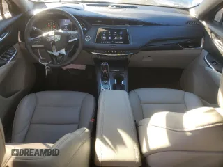 2023 Cadillac XT4 FWD Premium Luxury с VIN 1GYFZCR41PF111214, выставлен на аукционе Copart как лот 84897124 с пробегом 13 340 миль миль и Списание • Salvage title. История ставок и продаж доступна на DreamBid. Изображение 8.