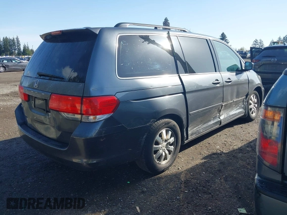 2010 Honda Odyssey EX-L with VIN 5FNRL3H67AB087262, listed as a IAAI auction lot 41999995 with 153,186 mi miles. Bid and sale history available at carsss.com. Image 4.