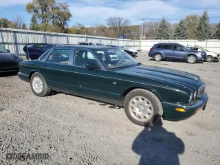 2002 Jaguar XJ with VIN SAJDA14CX2LF40535, listed as a Copart auction lot 78708334 with 74,862 mi miles and Salvage Title. Bid and sale history available at carsss.com. Image 4.