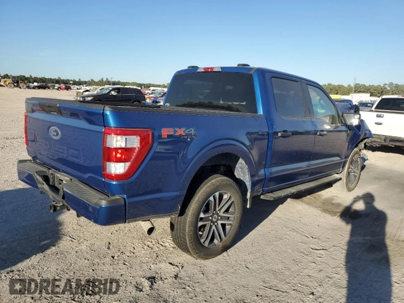 2023 Ford F-150 XL with VIN 1FTFW1E51PKF30933, listed as a Copart auction lot 76121834 with 26,267 mi miles and Salvage Title. Bid and sale history available at carsss.com. Image 3.