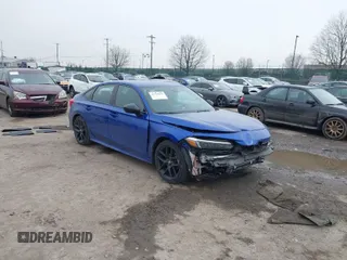 2023 Honda Civic Sport z VIN 2HGFE2F56PH502559, wystawiony jako IAAI lot #41558054 z przebiegiem 48 961 mil mil oraz . Historia ofert i sprzedaży dostępna na DreamBid. Obrazek 1.