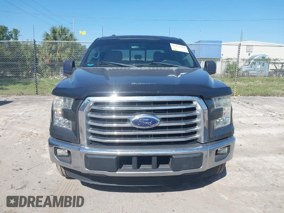 2015 Ford F-150 XL with VIN 1FTEW1CG2FFC70680, listed as a IAAI auction lot 41871782 with 143,875 mi miles. Bid and sale history available at carsss.com. Image 12.