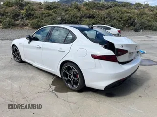 2022 Alfa Romeo Giulia Veloce с VIN ZARFAMBNXN7664866, выставлен на аукционе Copart как лот 55639185 с пробегом Не указан миль и Списание • Salvage title. История ставок и продаж доступна на DreamBid. Изображение 2.