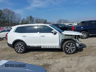 2020 Kia Telluride S with VIN 5XYP64HC2LG005623, listed as a IAAI auction lot 41492269 with 137,147 mi miles and . Bid and sale history available at DreamBid. Image 14.
