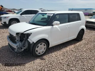 2014 Scion xB with VIN JTLZE4FE1EJ062614, listed as a Copart auction lot 50969405 with 129,595 mi miles and Salvage Title. Bid and sale history available at carsss.com. Image 1.
