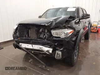 2019 Toyota Tacoma SR with VIN 5TFCZ5AN7KX167511, listed as a IAAI auction lot 42360585 with 65,213 mi miles and . Bid and sale history available at DreamBid. Image 6.