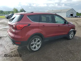 2019 Ford Escape Titanium with VIN 1FMCU0J98KUC00873, listed as a Copart auction lot 61674305 with 53,554 mi miles and Salvage title. Bid and sale history available at DreamBid. Image 3.