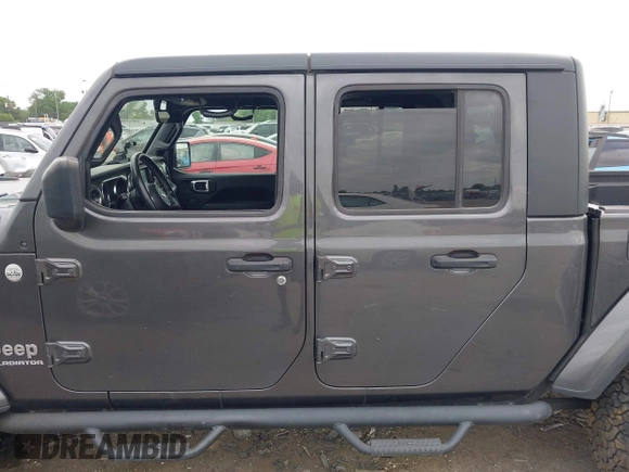 2020 Jeep Gladiator Overland with VIN 1C6HJTFG8LL166086, listed as a IAAI auction lot 42016222 with 102,232 mi miles and . Bid and sale history available at DreamBid. Image 14.
