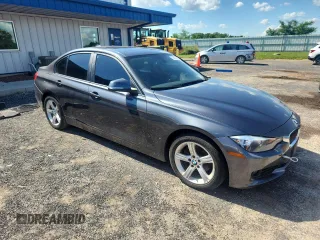 2013 BMW 3 Series 320i xDrive with VIN WBA3C3C51DF980707, listed as a Copart auction lot 63655825 with 148,487 mi miles and Clean title. Bid and sale history available at DreamBid. Image 4.