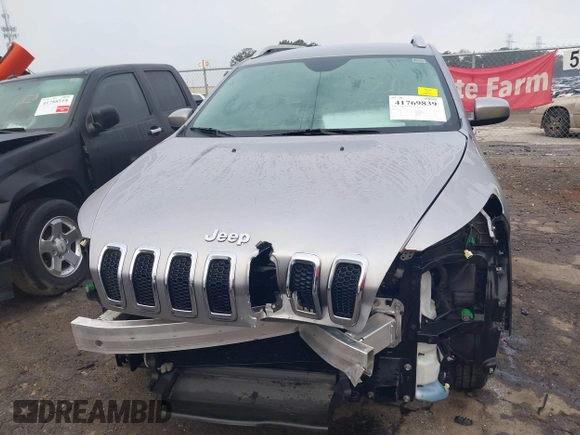 2016 Jeep Cherokee Latitude with VIN 1C4PJLCS7GW336973, listed as a IAAI auction lot 41769839 with 89,805 mi miles. Bid and sale history available at carsss.com. Image 6.