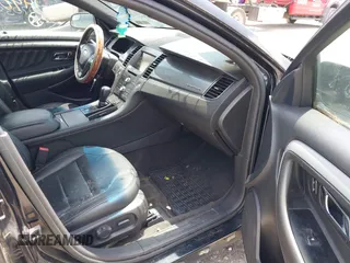2015 Ford Taurus SEL z VIN 1FAHP2E88FG136181, wystawiony jako IAAI lot #42681490 z przebiegiem 230 000 mil mil oraz . Historia ofert i sprzedaży dostępna na DreamBid. Obrazek 5.
