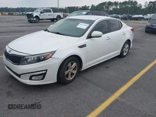 2015 Kia Optima LX z VIN KNAGM4A77F5648515, wystawiony jako IAAI lot #42413810 z przebiegiem 180 827 mil mil oraz . Historia ofert i sprzedaży dostępna na DreamBid. Obrazek 2.