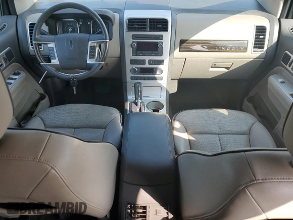 2009 Lincoln MKX with VIN 2LMDU88C69BJ13322, listed as a Copart auction lot 70686844 with 129,384 mi miles and Salvage Title. Bid and sale history available at DreamBid. Image 8.