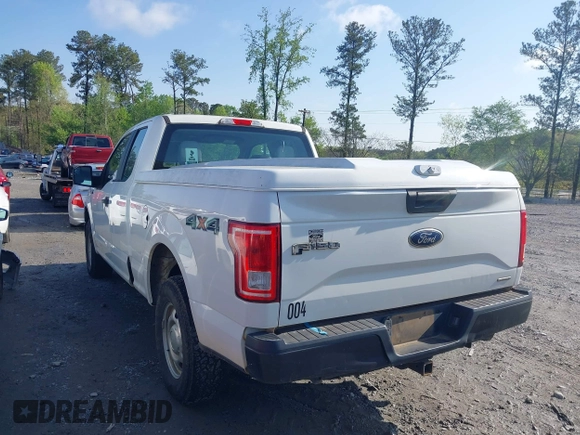 2016 Ford F-150 XLT with VIN 1FTEX1E89GFA95834, listed as a IAAI auction lot 41986995 with 153,202 mi miles. Bid and sale history available at carsss.com. Image 3.