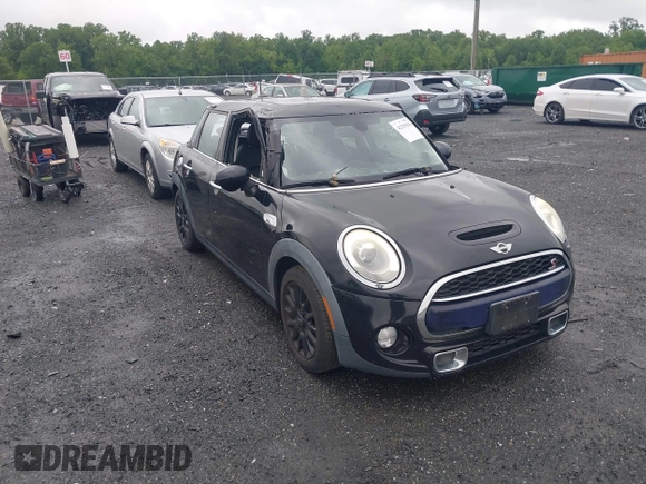 2015 MINI Hardtop 4 Door S with VIN WMWXU3C55F2B56429, listed as a IAAI auction lot 42335996 with 114,781 mi miles and . Bid and sale history available at DreamBid. Image 1.