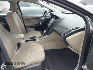 2015 Ford Focus SE with VIN 1FADP3F29FL342311, listed as a IAAI auction lot 42109683 with 70,579 mi miles. Bid and sale history available at carsss.com. Image 5.