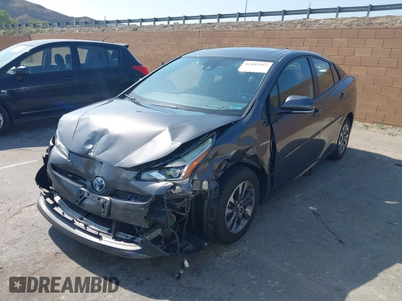 2021 Toyota Prius L Eco with VIN JTDKAMFU4M3144985, listed as a IAAI auction lot 42443957 with 20,816 mi miles and . Bid and sale history available at DreamBid. Image 18.
