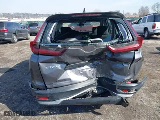 2020 Honda CR-V LX with VIN 2HKRW2H20LH607675, listed as a IAAI auction lot 41645896 with 64,973 mi miles. Bid and sale history available at carsss.com. Image 16.