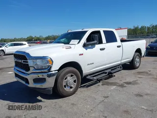 2021 Ram 2500 Tradesman z VIN 3C6UR4HJ3MG501081, wystawiony jako IAAI lot #41853135 z przebiegiem 70 421 mil mil oraz . Historia ofert i sprzedaży dostępna na DreamBid. Obrazek 2.