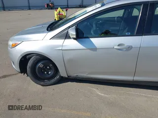 2016 Ford Focus SE with VIN 1FADP3F24GL230601, listed as a IAAI auction lot 41988130 with 176,366 mi miles. Bid and sale history available at carsss.com. Image 14.