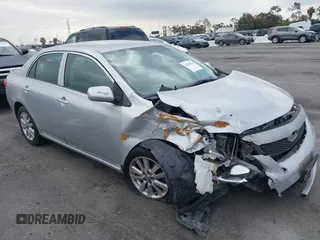2010 Toyota Corolla with VIN 1NXBU4EE4AZ179951, listed as a IAAI auction lot 42136926 with 148,383 mi miles. Bid and sale history available at carsss.com. Image 1.