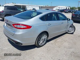 2016 Ford Fusion SE with VIN 3FA6P0T90GR374060, listed as a IAAI auction lot 42037332 with 145,676 mi miles. Bid and sale history available at carsss.com. Image 4.