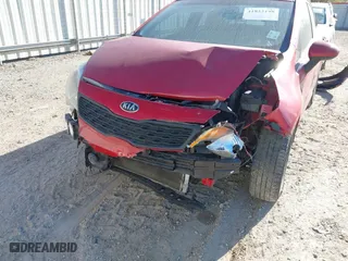 2016 Kia Rio EX with VIN KNADN4A31G6633713, listed as a IAAI auction lot 41822198 with 57,970 mi miles. Bid and sale history available at carsss.com. Image 6.