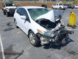 2010 Honda Insight EX with VIN JHMZE2H71AS012927, listed as a IAAI auction lot 42455037 with Not provided miles and . Bid and sale history available at DreamBid. Image 1.
