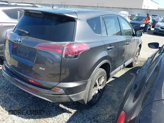 2018 Toyota RAV4 XLE with VIN JTMWFREV6JJ175575, listed as a IAAI auction lot 41788004 with 112,577 mi miles. Bid and sale history available at carsss.com. Image 4.