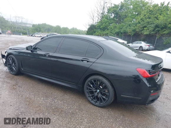 2021 BMW 7 Series 740i with VIN WBA7T2C0XMCF73506, listed as a IAAI auction lot 42335145 with 35,838 mi miles and . Bid and sale history available at DreamBid. Image 3.