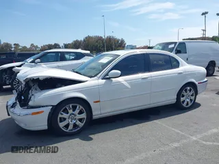 2006 Jaguar X-Type z VIN SAJWA51A76WE86537, wystawiony jako IAAI lot #42287581 z przebiegiem Nie podano mil oraz . Historia ofert i sprzedaży dostępna na DreamBid. Obrazek 14.