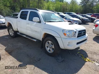 2006 Toyota Tacoma PreRunner z VIN 3TMKU72NX6M008076, wystawiony jako IAAI lot #41890189 z przebiegiem 234 660 mil mil oraz . Historia ofert i sprzedaży dostępna na DreamBid. Obrazek 1.
