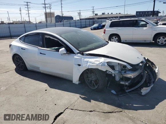 2021 Tesla Model 3 Standard Range Plus with VIN 5YJ3E1EA8MF874156, listed as a Copart auction lot 46323505 with Not Provided miles and Salvage Title. Bid and sale history available at DreamBid. Image 4.