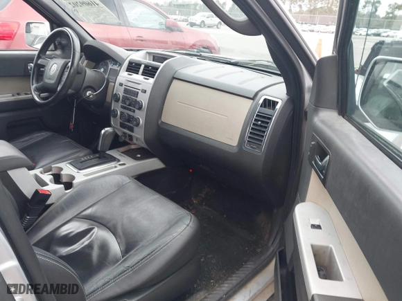2010 Mercury Mariner Premier with VIN 4M2CN8H71AKJ14877, listed as a IAAI auction lot 41609202 with 232,706 mi miles. Bid and sale history available at carsss.com. Image 5.