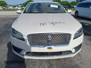 2017 Lincoln MKZ Hybrid Premiere с VIN 3LN6L5KU1HR631619, выставлен на аукционе IAAI как лот 39746492 с пробегом Не указан миль и . История ставок и продаж доступна на DreamBid. Изображение 15.